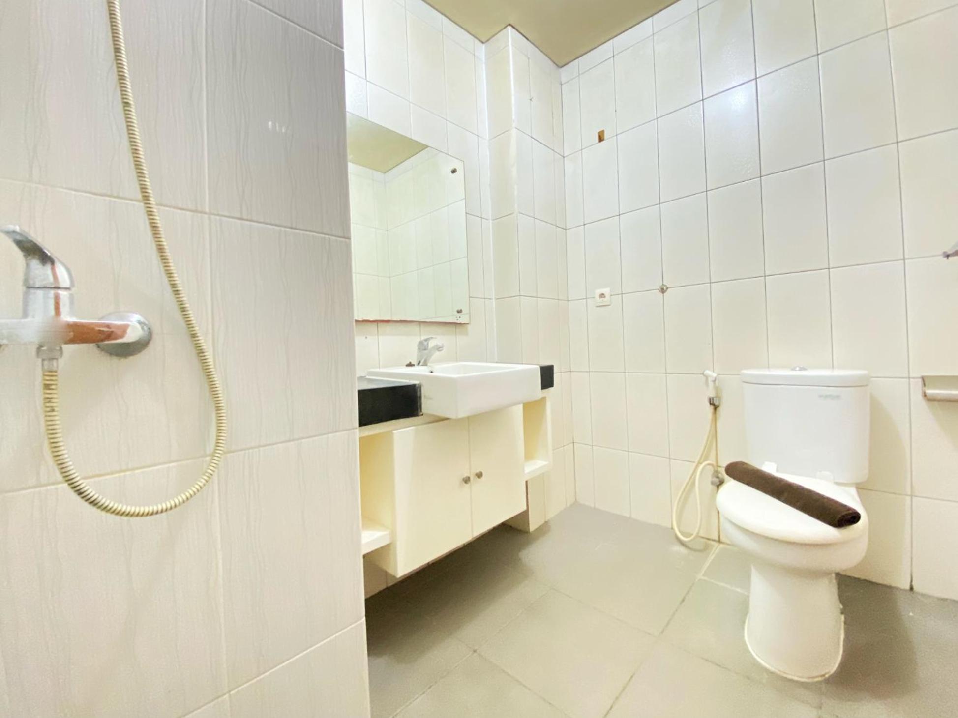 Warm And Cozy At Dago By Travelio Apartemen *